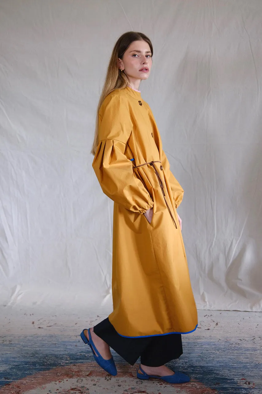 Raincoat. coucher de soleil