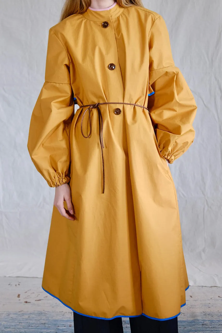 Raincoat. coucher de soleil