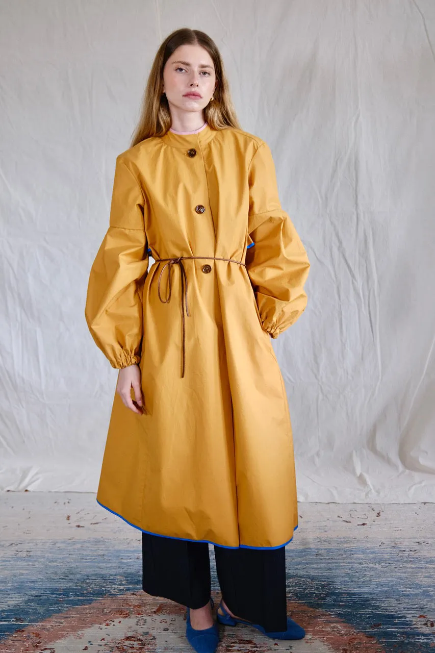 Raincoat. coucher de soleil